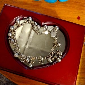 A silver bell bracelet